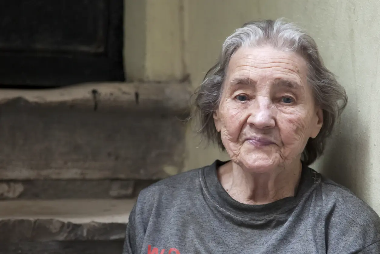 older-female-in-poverty-portrait-looking-forward
