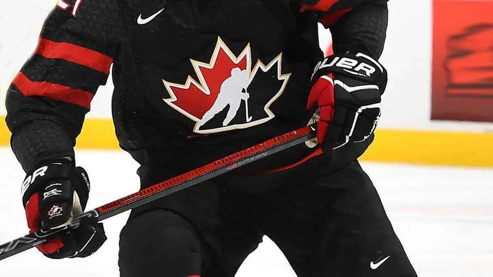 a hockey Canada player skates on the ice during a game