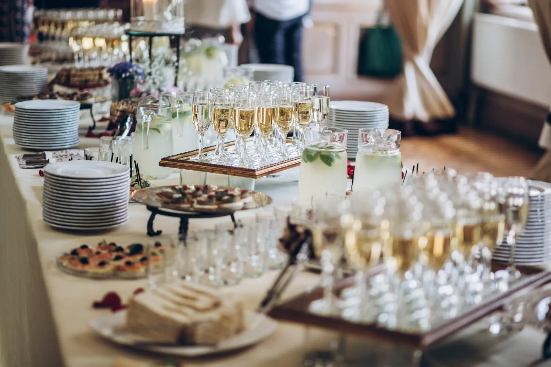 glasses of sparkling wine set up for holiday party guests