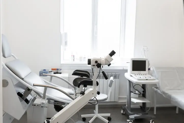 gynecological chair in a gynecologist's office gynecological chair in a gynecologist's office