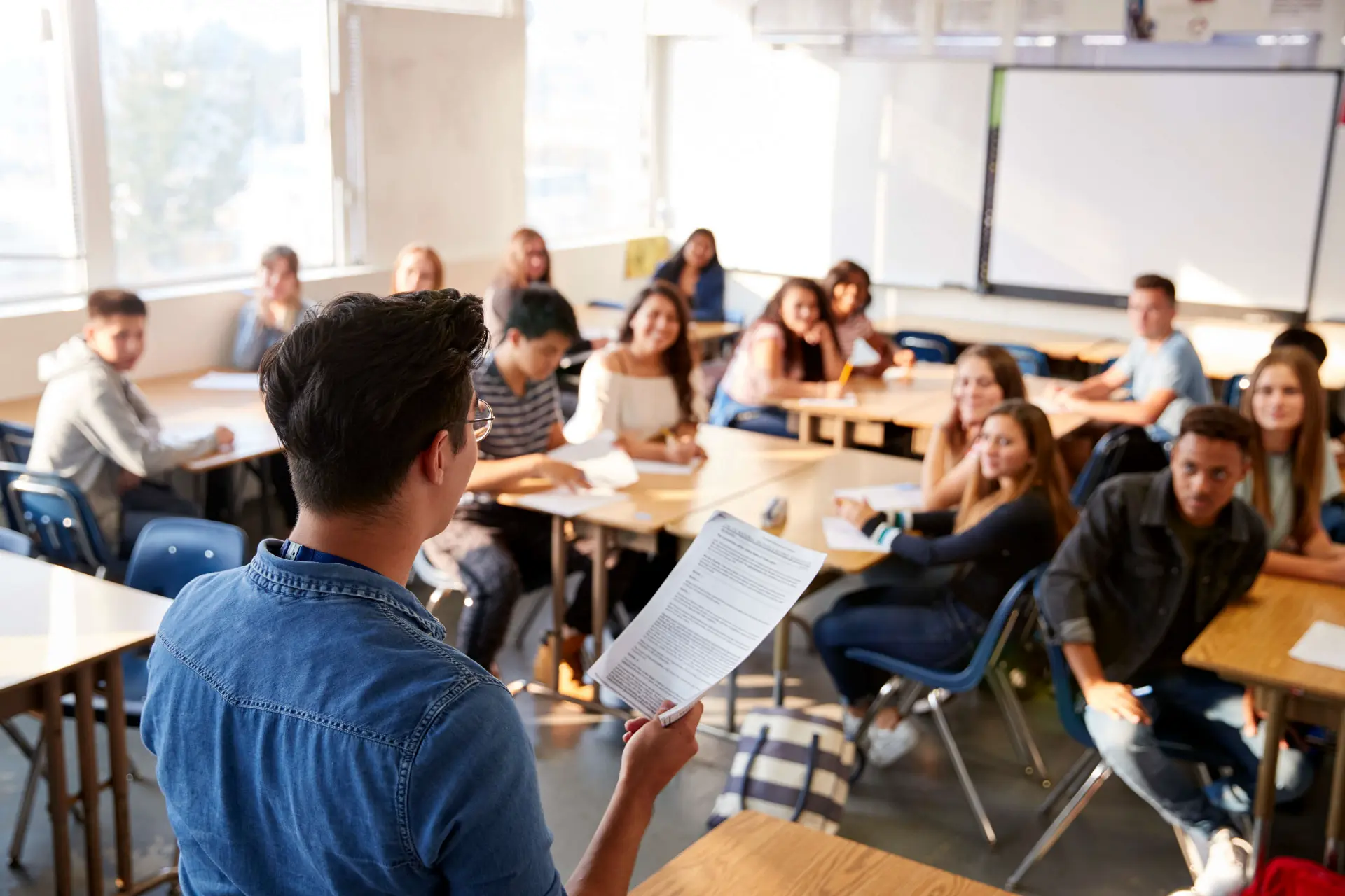 an educator discusses consent to a classroom full of students