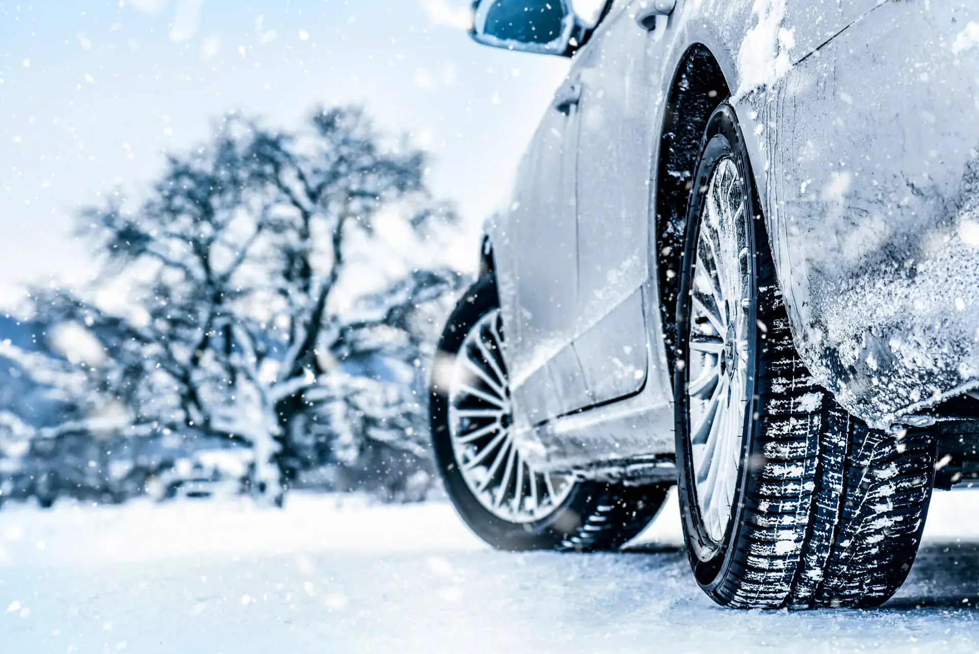 silver car practicing winter driving safety