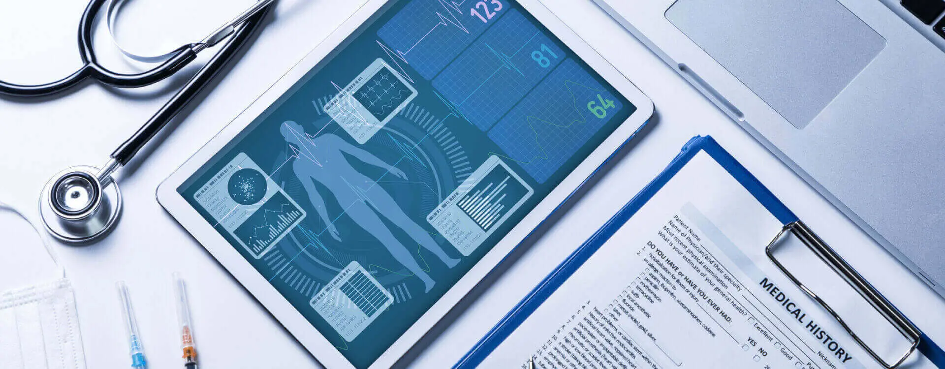 Rendering of patient's vitals displayed on tablet alongside their medical history.