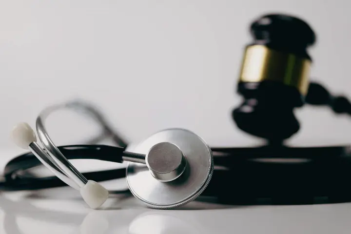 stethoscope next to gavel