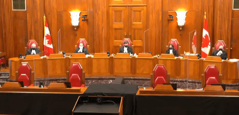 Photo of Supreme Court of Canada justices listen to a case