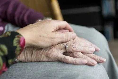 two-people-holding-hands